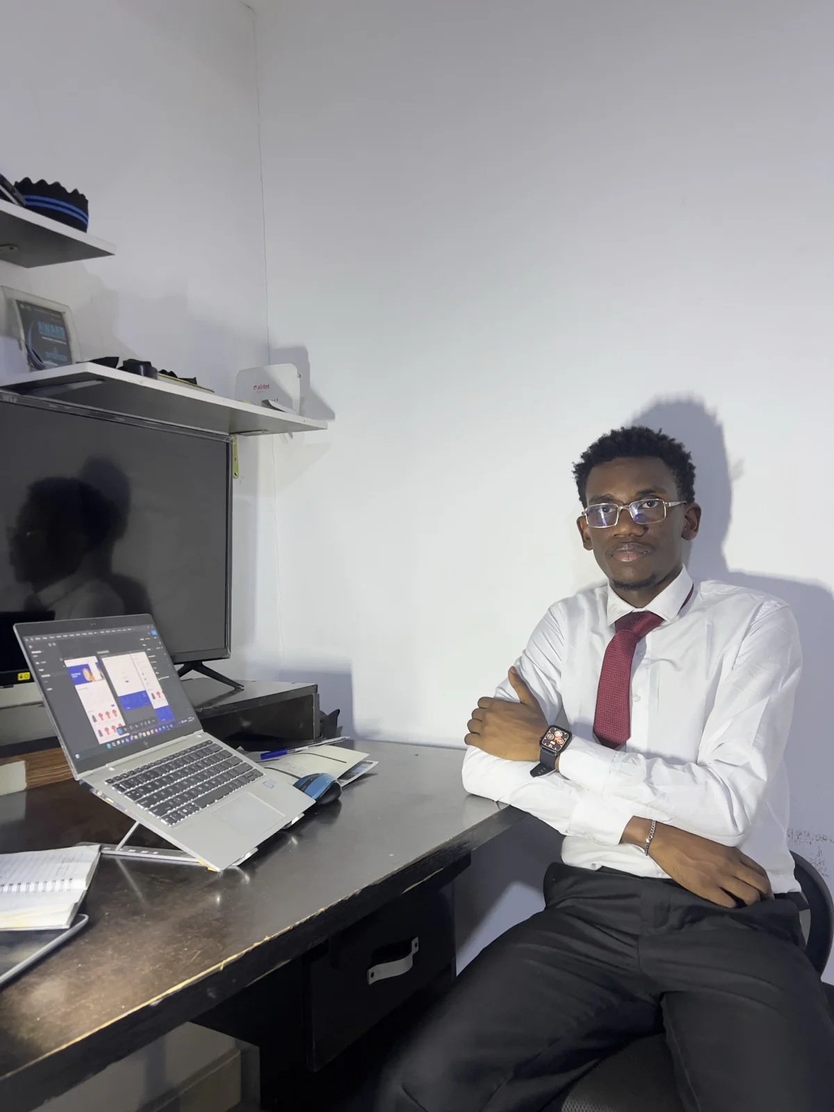 Korede Adeyemi at his desk